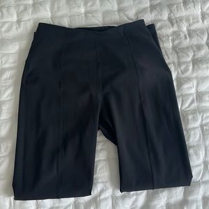 Lululemon skinny gently warm pants for work in office setting.